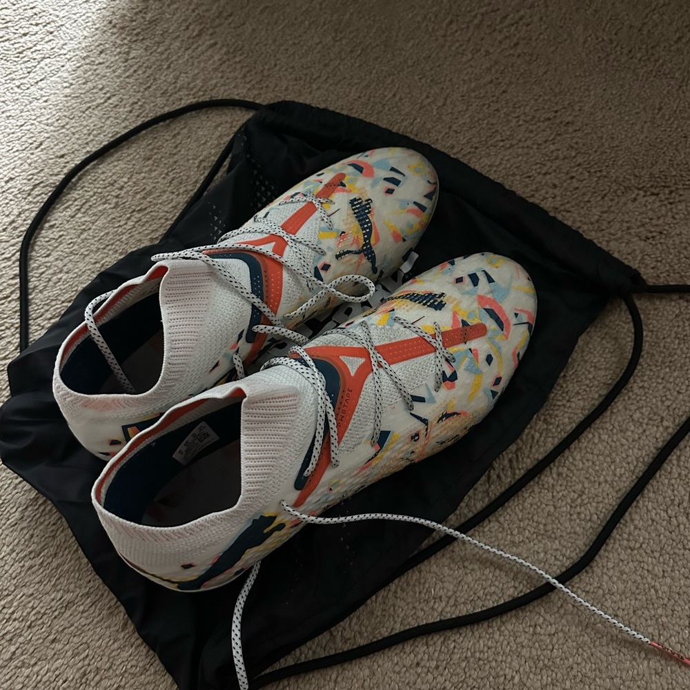 PUMA FUTURE 7 ELITE soccer cleats.